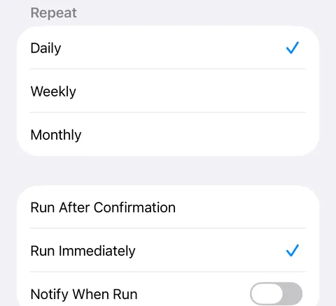 The same screen after a swipe up on Daily: Repeat Daily, Run Immediately ticked, Notify When Run off.